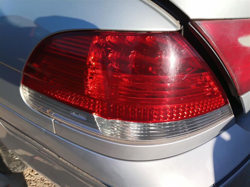Used OEM Driver Side Left Tail Light Lamp Assembly from 2006 BMW 750I