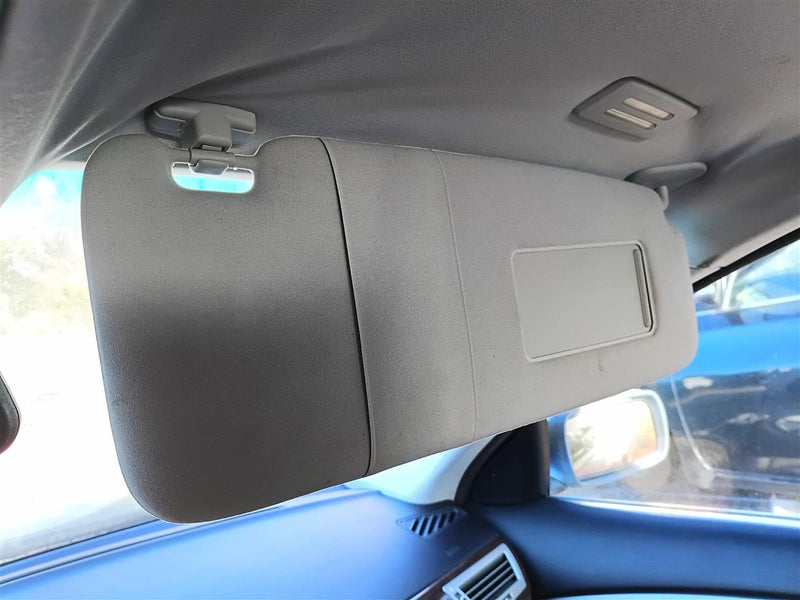 Used OEM Passenger Side Right Sun Visor from 2006 BMW 750I
