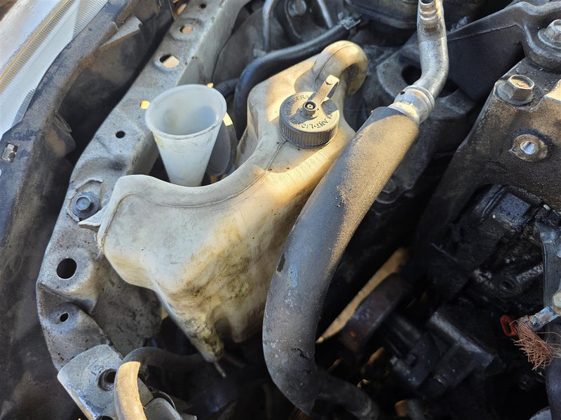 Used OEM Passenger Side Right Coolant Overflow Reservoir Tank from 2011 Nissan Altima