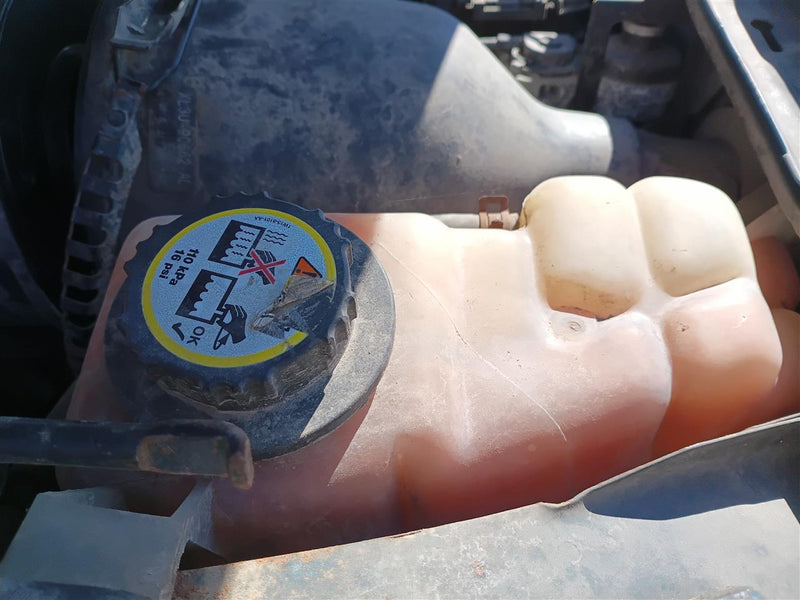Used OEM Coolant Overflow Reservoir Tank from 2002 Ford F150