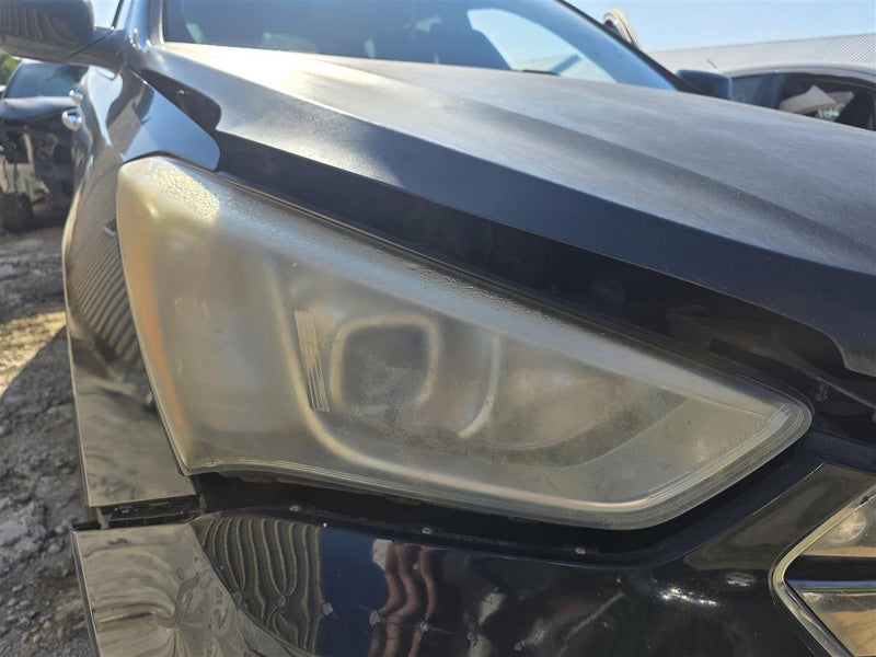 Used OEM Passenger Side Right Headlight Headlamp Assembly from 2013 Hyundai Santa FE