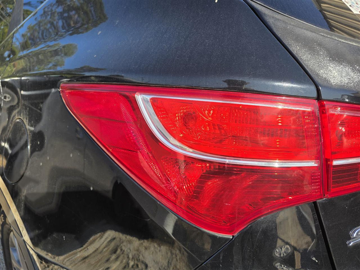 Used OEM Driver Side Left Tail Light Lamp Assembly from 2013 Hyundai Santa FE