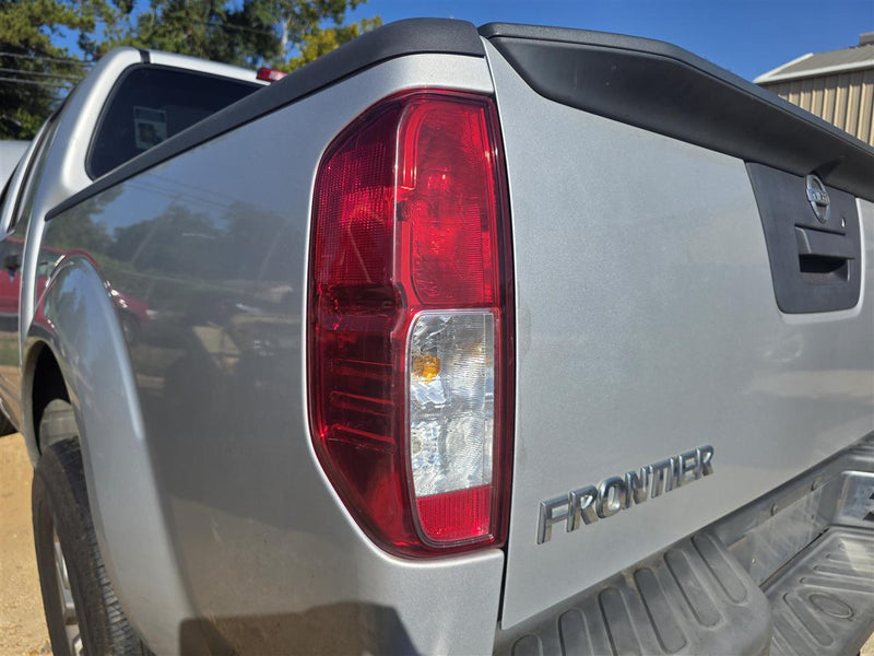 Used OEM Driver Side Left Tail Light Lamp Assembly from 2014 Nissan Frontier