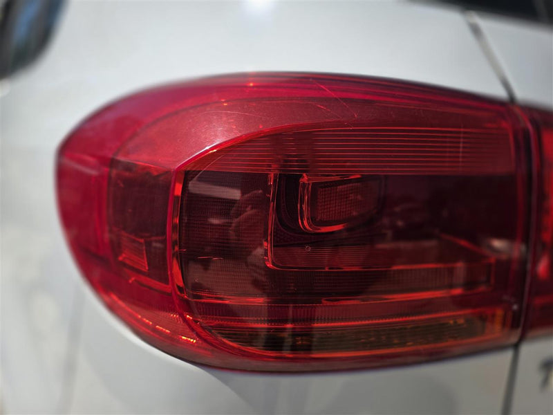 Used OEM Driver Side Left Tail Light Lamp Assembly from 2014 Volkswagen Tiguan