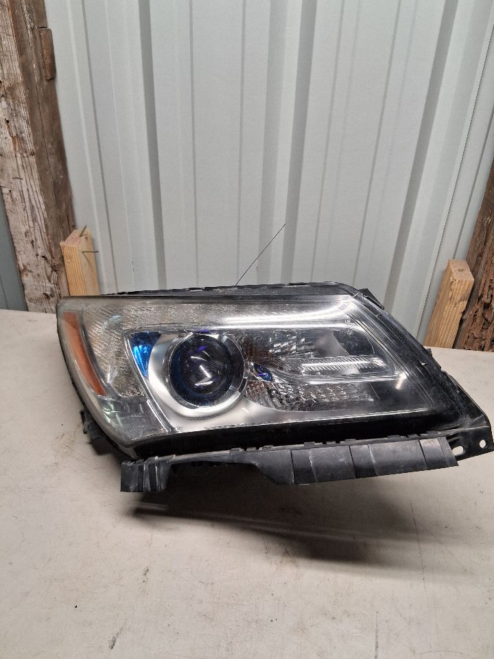 Used OEM Passenger Side Right Headlight Headlamp Assembly from 2016 Buick Lacrosse
