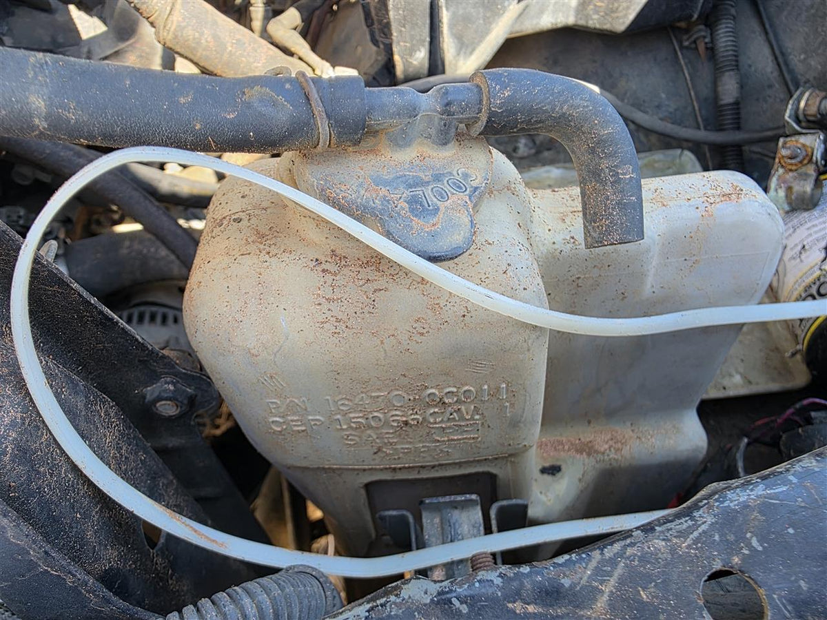 Used OEM Coolant Overflow Reservoir Tank from 1999 Toyota Tacoma