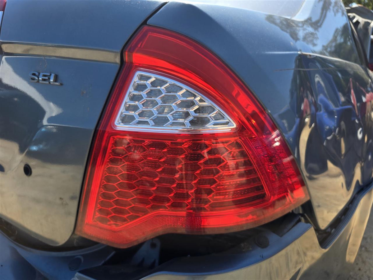 Used OEM Passenger Side Right Tail Light Lamp Assembly from 2011 Ford Fusion