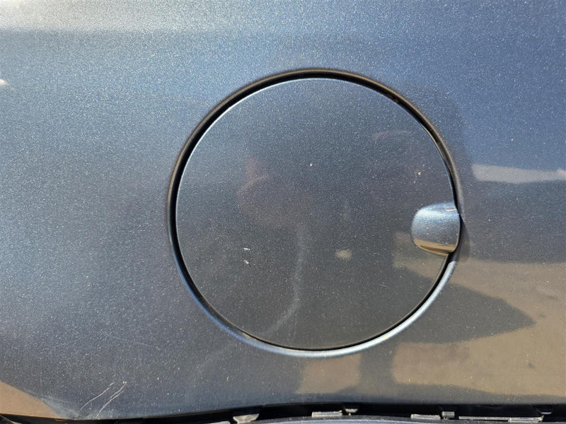 Used OEM Fuel Filler Gas Door Lid from 2011 Ford Fusion