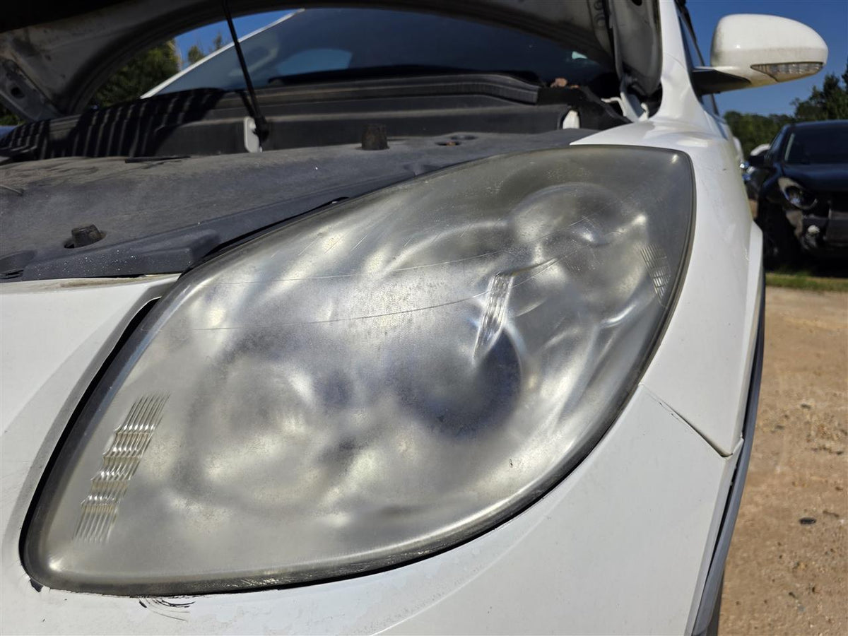 Used OEM Driver Side Left Headlight Headlamp Assembly from 2011 Buick Enclave