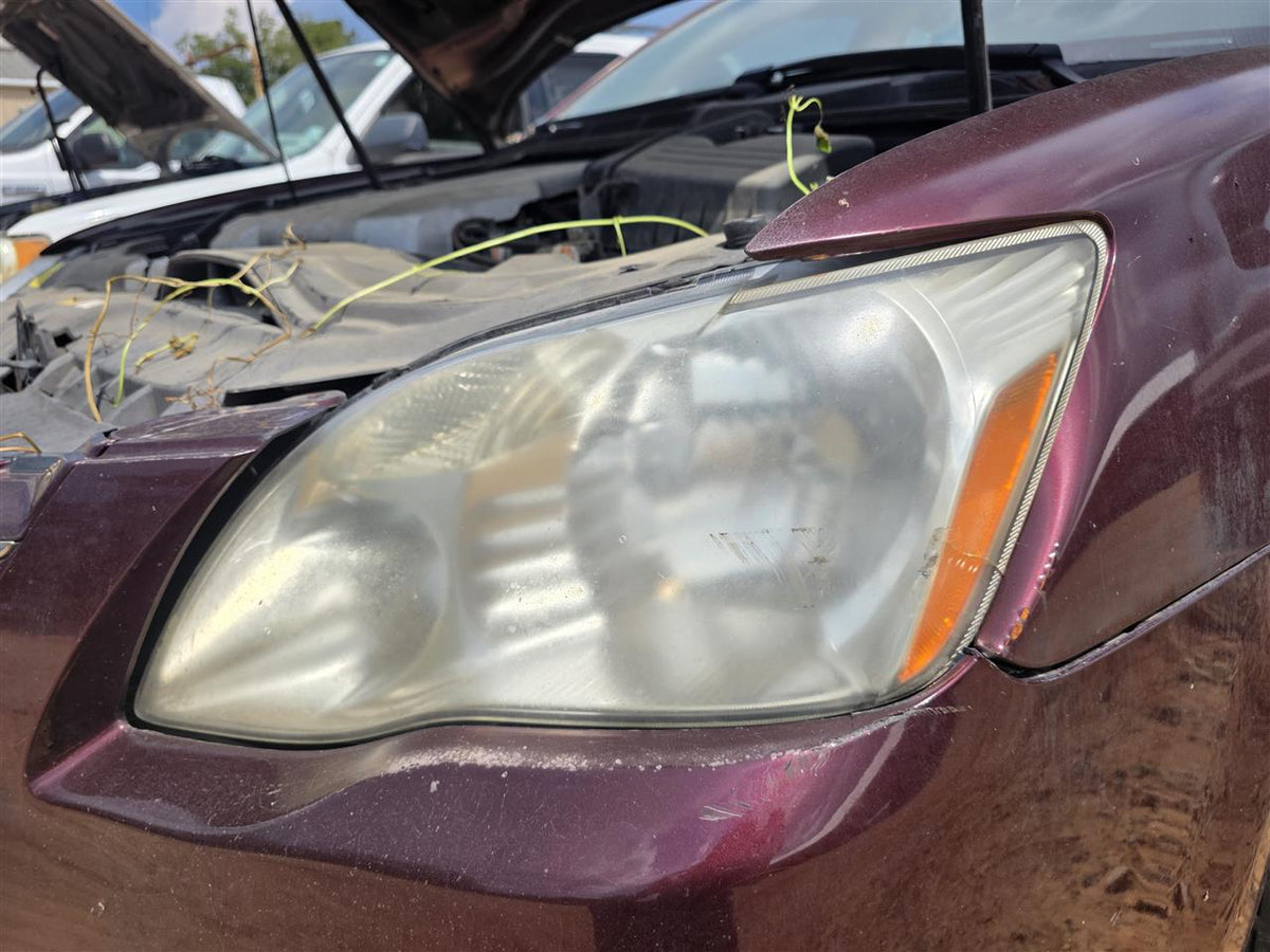 Used OEM Driver Side Left Headlight Headlamp Assembly from 2007 Toyota