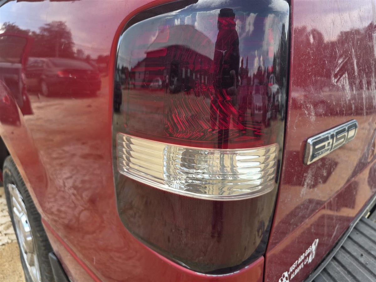 Used OEM Driver Side Left Tail Light Lamp Assembly from 2008 Ford F150