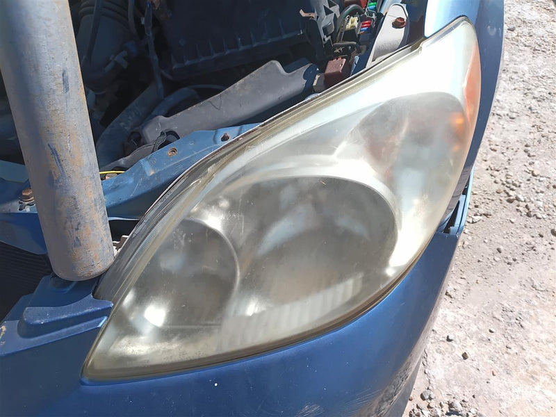 Used OEM Driver Side Left Headlight Headlamp Assembly from 2003 Toyota Matrix