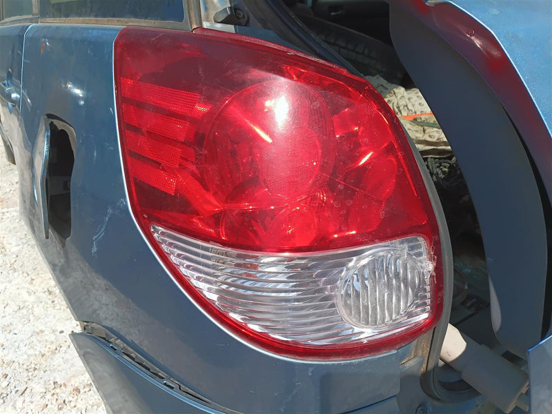 Used OEM Driver Side Left Tail Light Lamp Assembly from 2003 Toyota Matrix