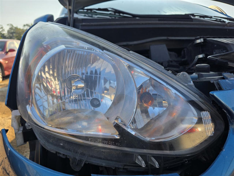 Used OEM Passenger Side Right Headlight Headlamp Assembly from 2015 Mitsubishi Mirage