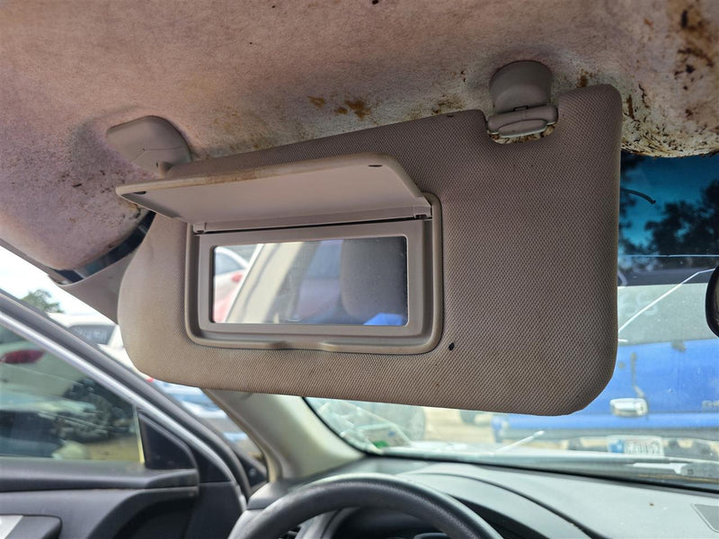 Used OEM Driver Side Left Sun Visor from 2013 Nissan Altima