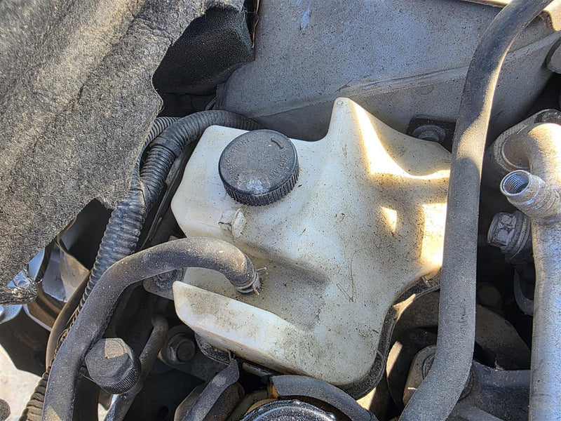 Used OEM Coolant Overflow Reservoir Tank from 2013 Nissan Altima