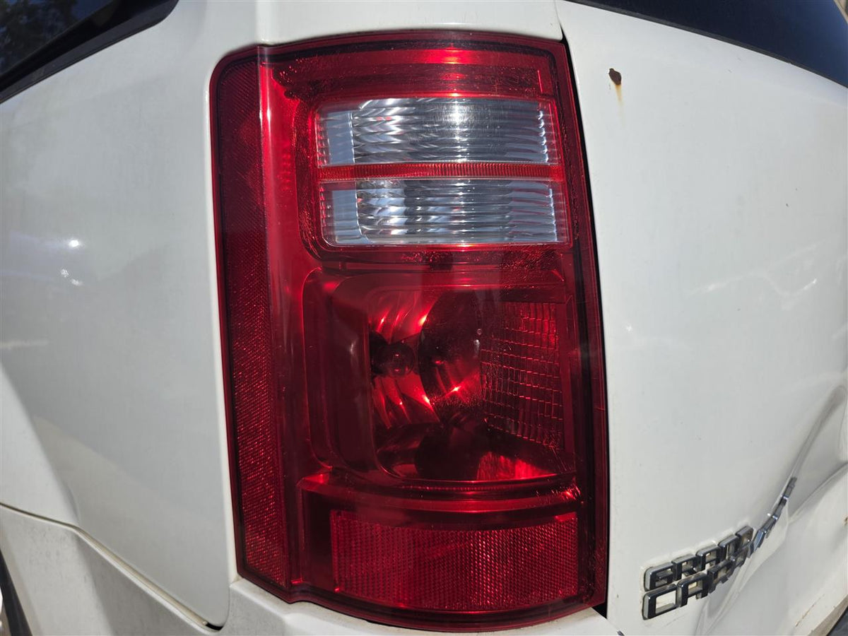 Used OEM Driver Side Left Tail Light Lamp Assembly from 2008 Dodge Caravan