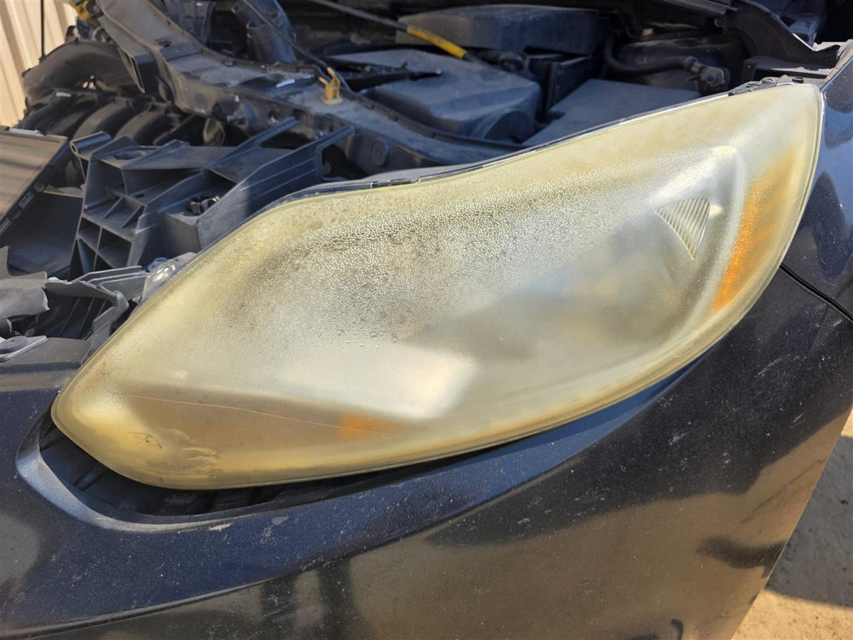 Used OEM Driver Side Left Headlight Headlamp Assembly from 2012 Ford Focus