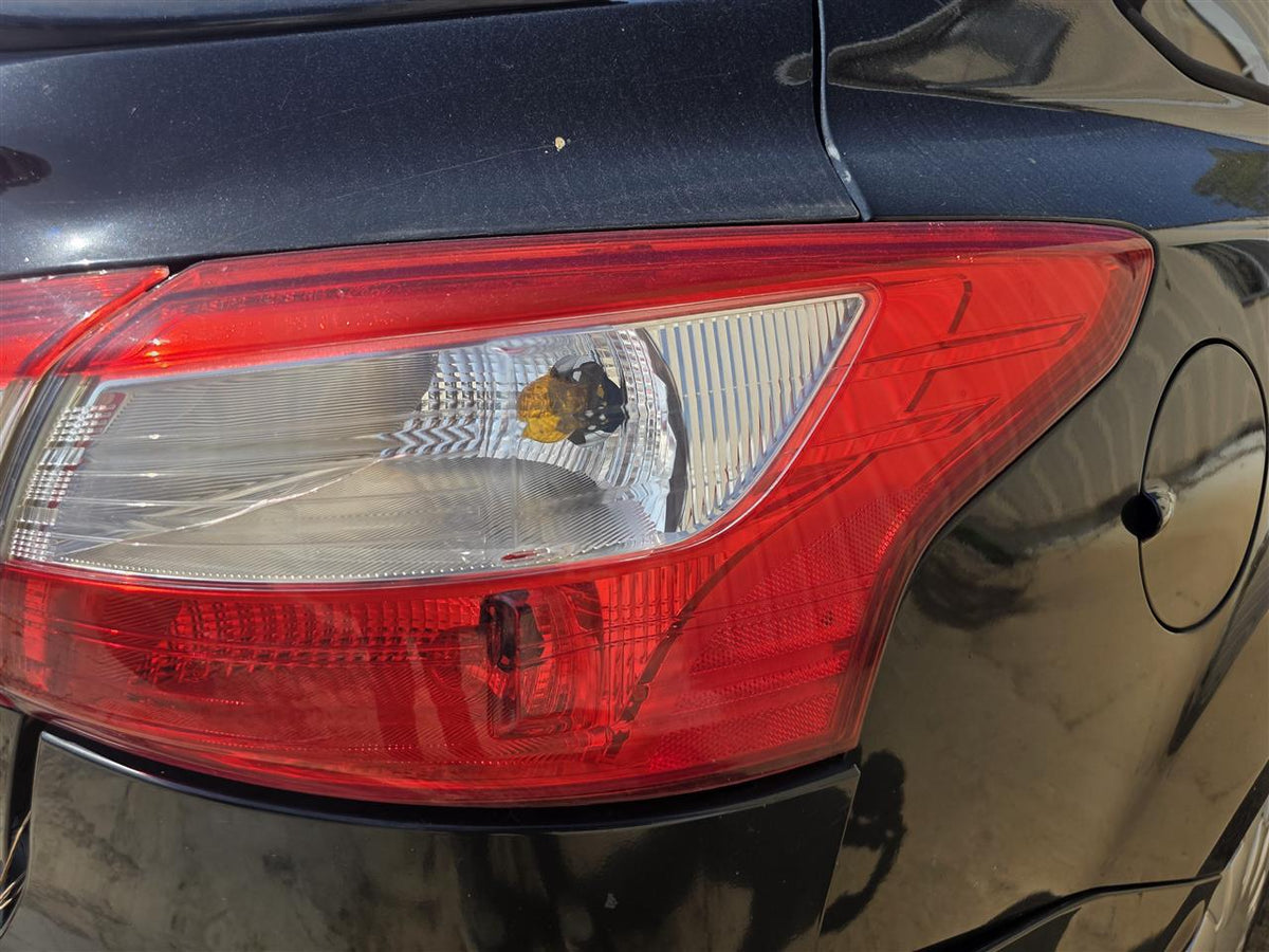 Used OEM Passenger Side Right Tail Light Lamp Assembly from 2012 Ford Focus