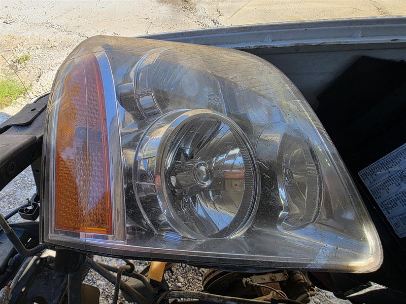 Used OEM Passenger Side Right Headlight Headlamp Assembly from 2007 GMC