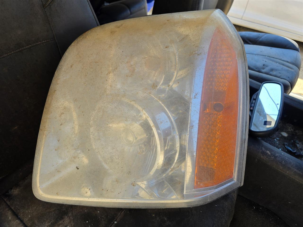 Used OEM Driver Side Left Headlight Headlamp Assembly from 2007 GMC