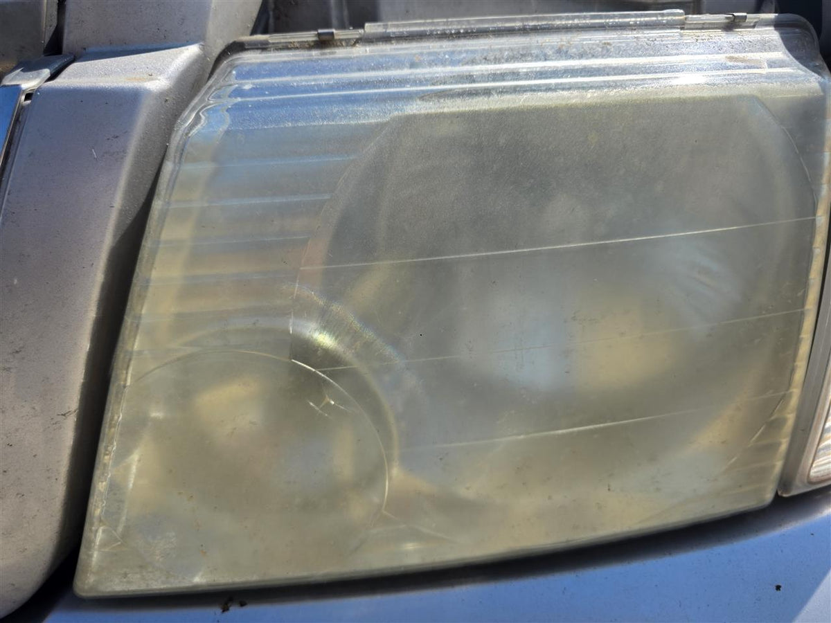 Used OEM Driver Side Left Headlight Headlamp Assembly from 2004 Ford Explorer