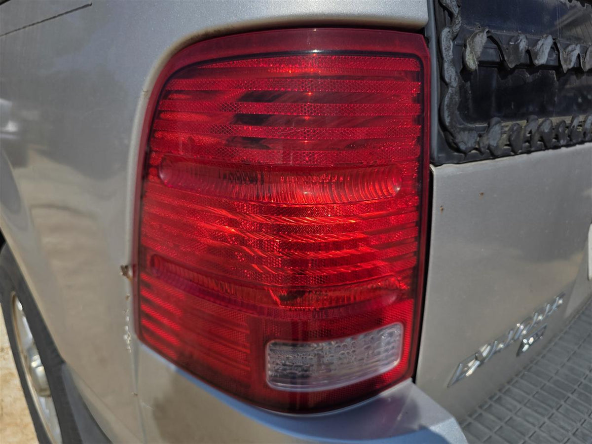 Used OEM Driver Side Left Tail Light Lamp Assembly from 2004 Ford Explorer
