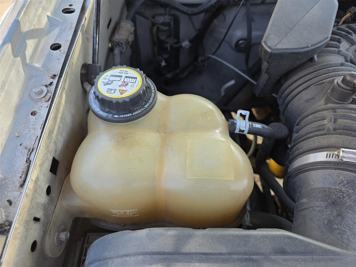 Used OEM Coolant Overflow Reservoir Tank from 2004 Ford Explorer