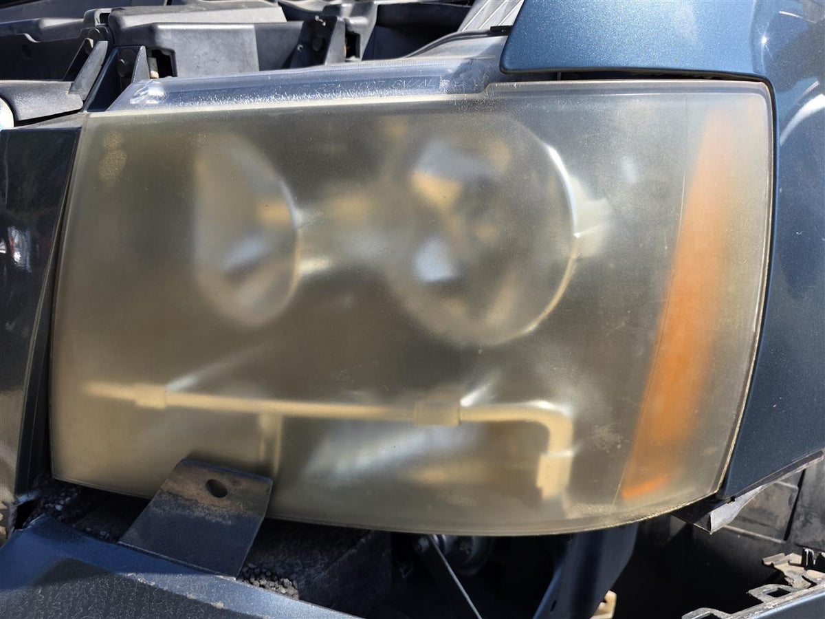Used OEM Driver Side Left Headlight Headlamp Assembly from 2008 Chevrolet Tahoe