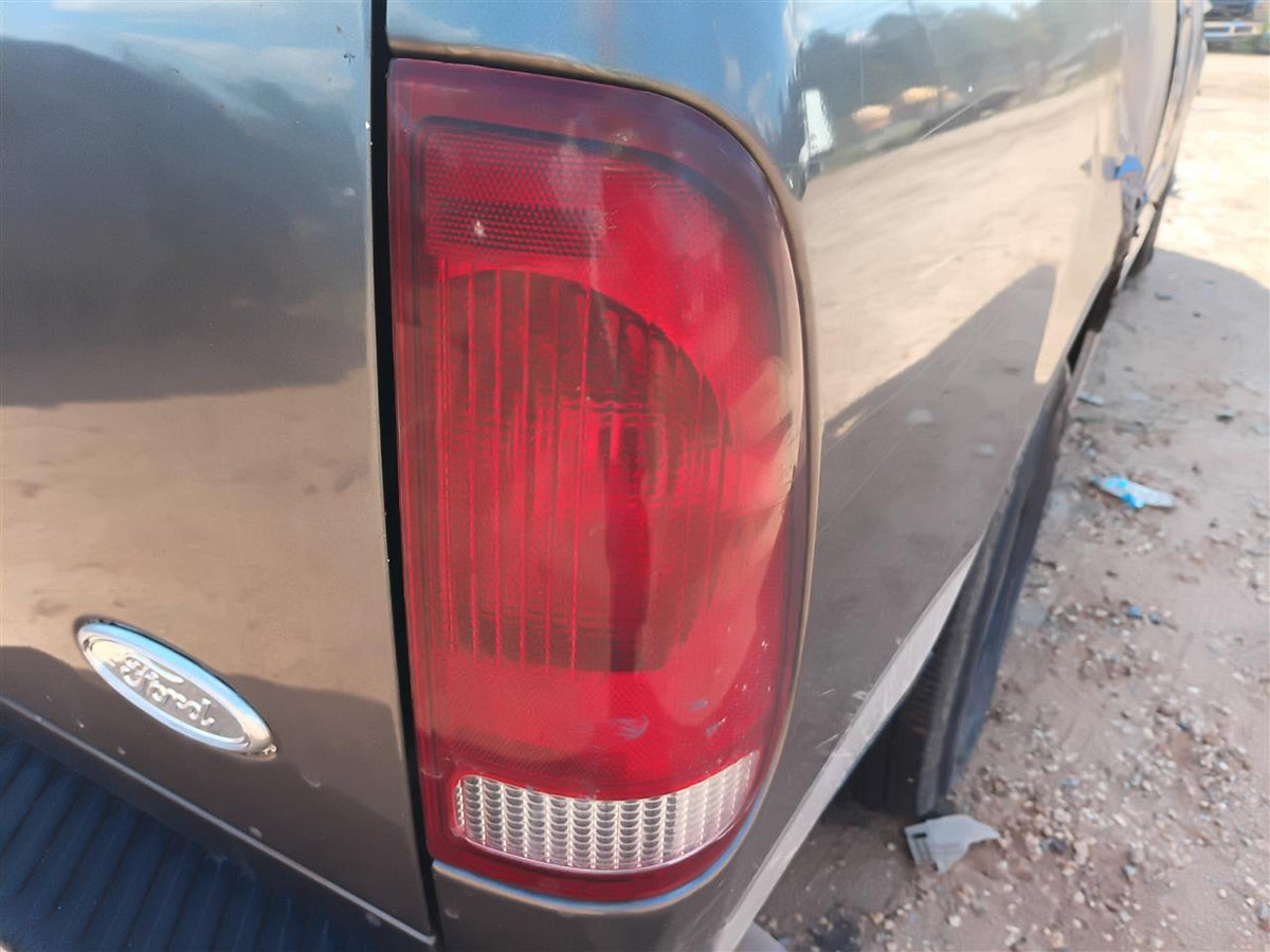Used OEM Passenger Side Right Tail Light Lamp Assembly from 2002 Ford F150
