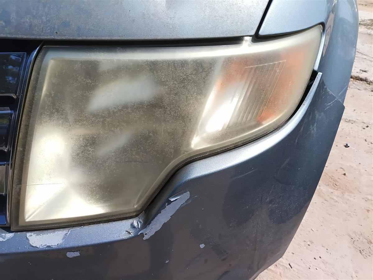 Used OEM Driver Side Left Headlight Headlamp Assembly from 2007 Ford Edge