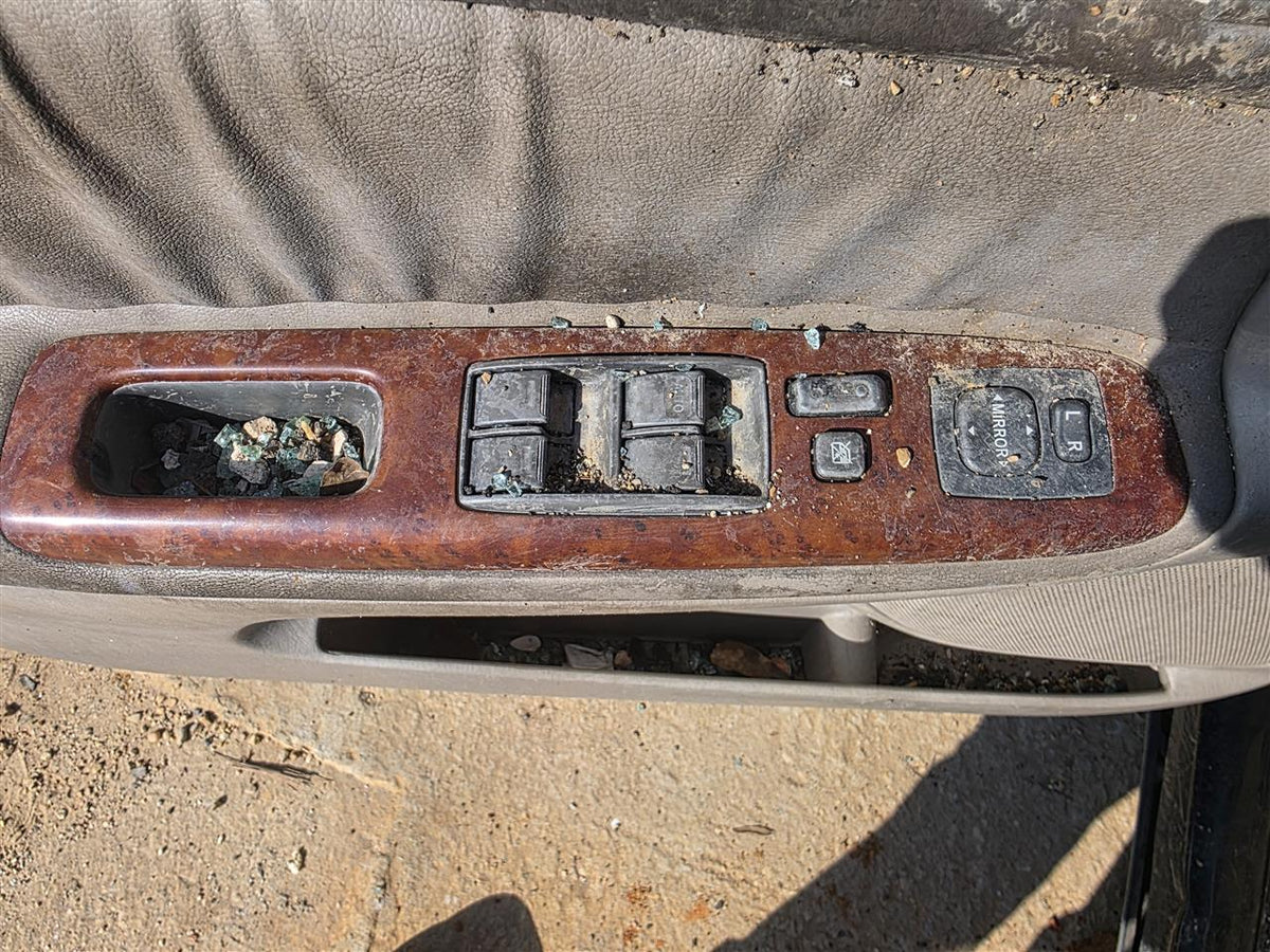 Used OEM Driver Side Left Front Door Window Master Switch from 2006 Toyota