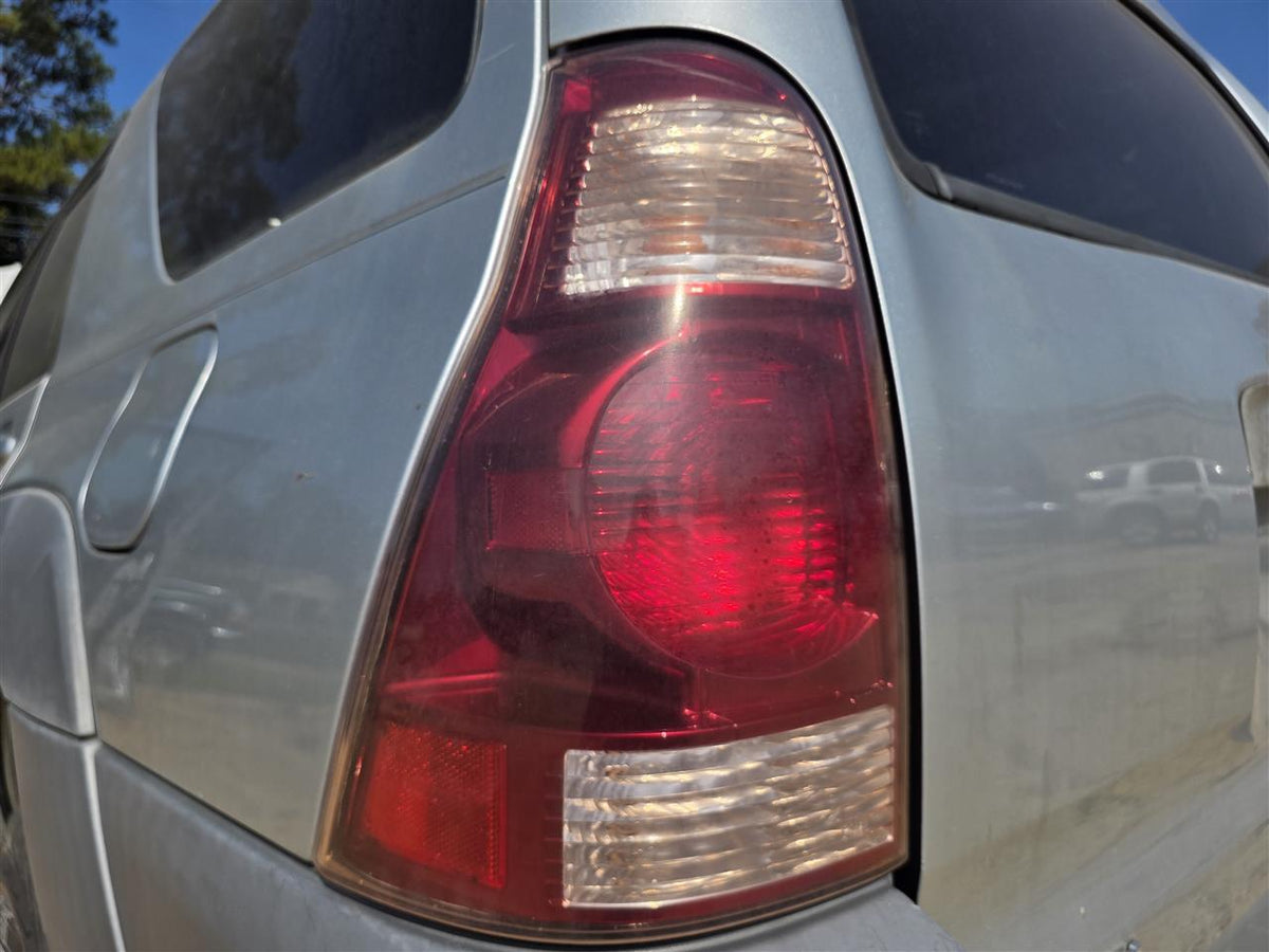 Used OEM Driver Side Left Tail Light Lamp Assembly from 2003 Toyota 4 Runner