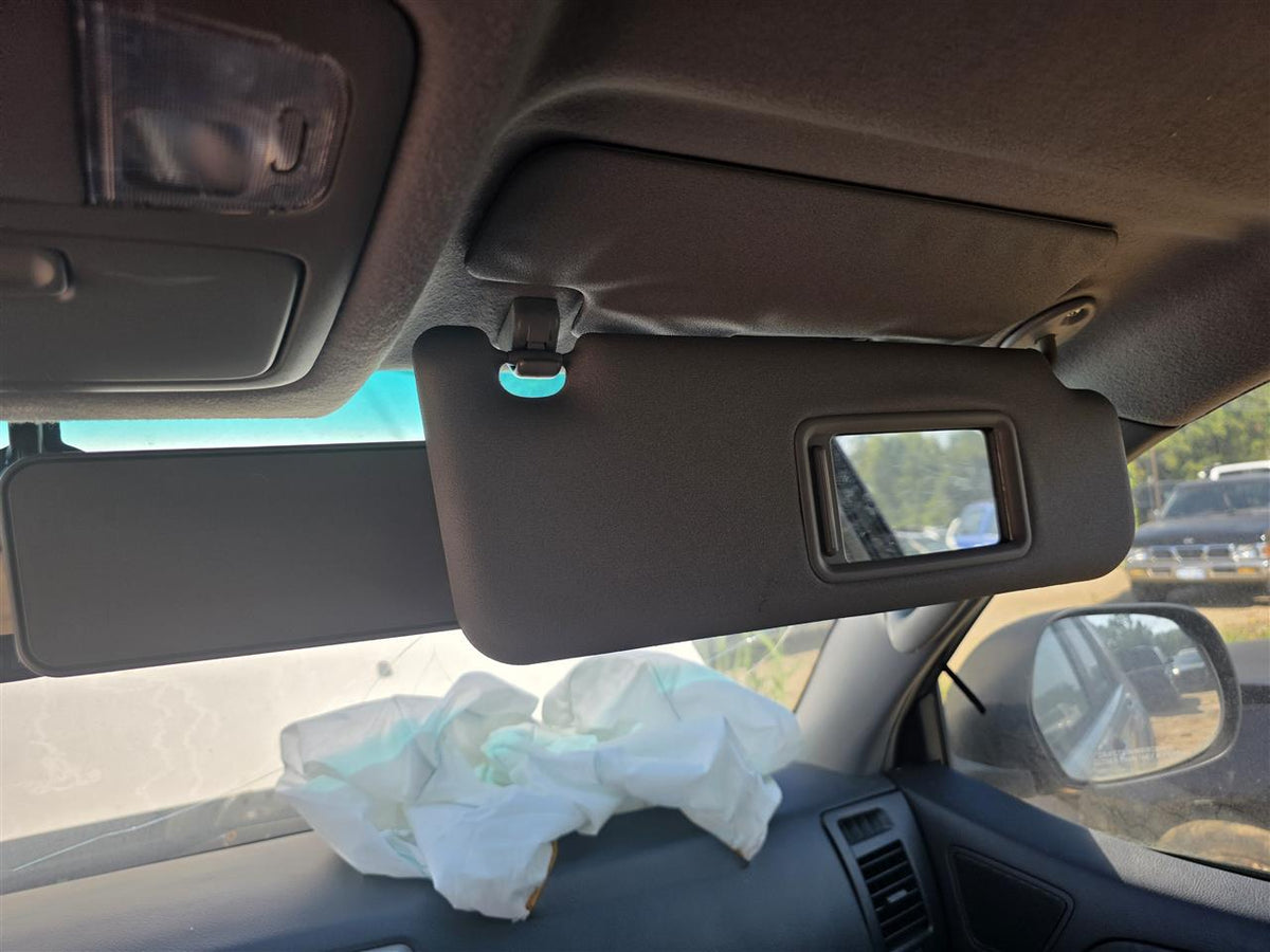 Used OEM Passenger Side Right Sun Visor from 2003 Toyota 4 Runner