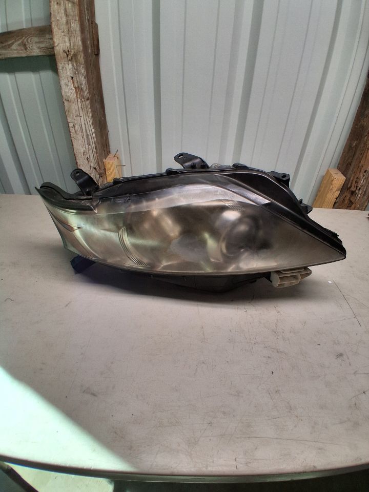 Used OEM Passenger Side Right Headlight Headlamp Assembly from 2011 Lexus RX350
