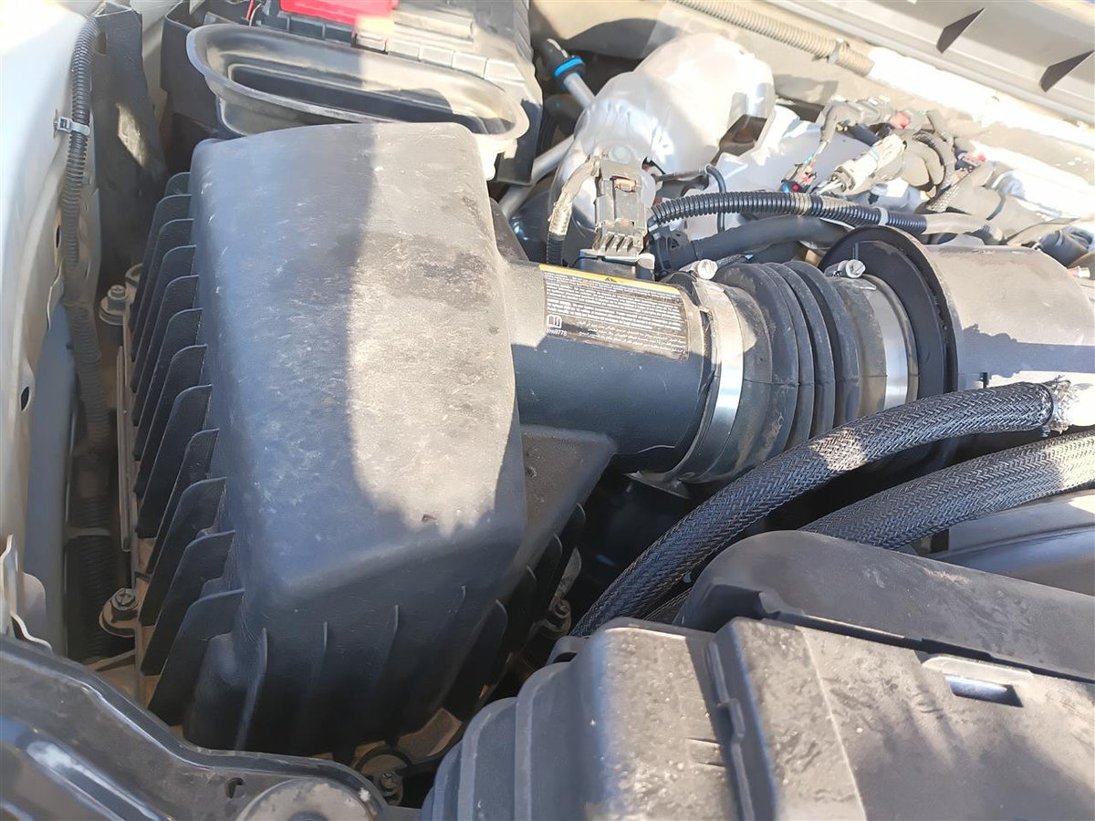 Used OEM Air Cleaner Intake Filter Box from 2023 GMC Sierra Denali 2500