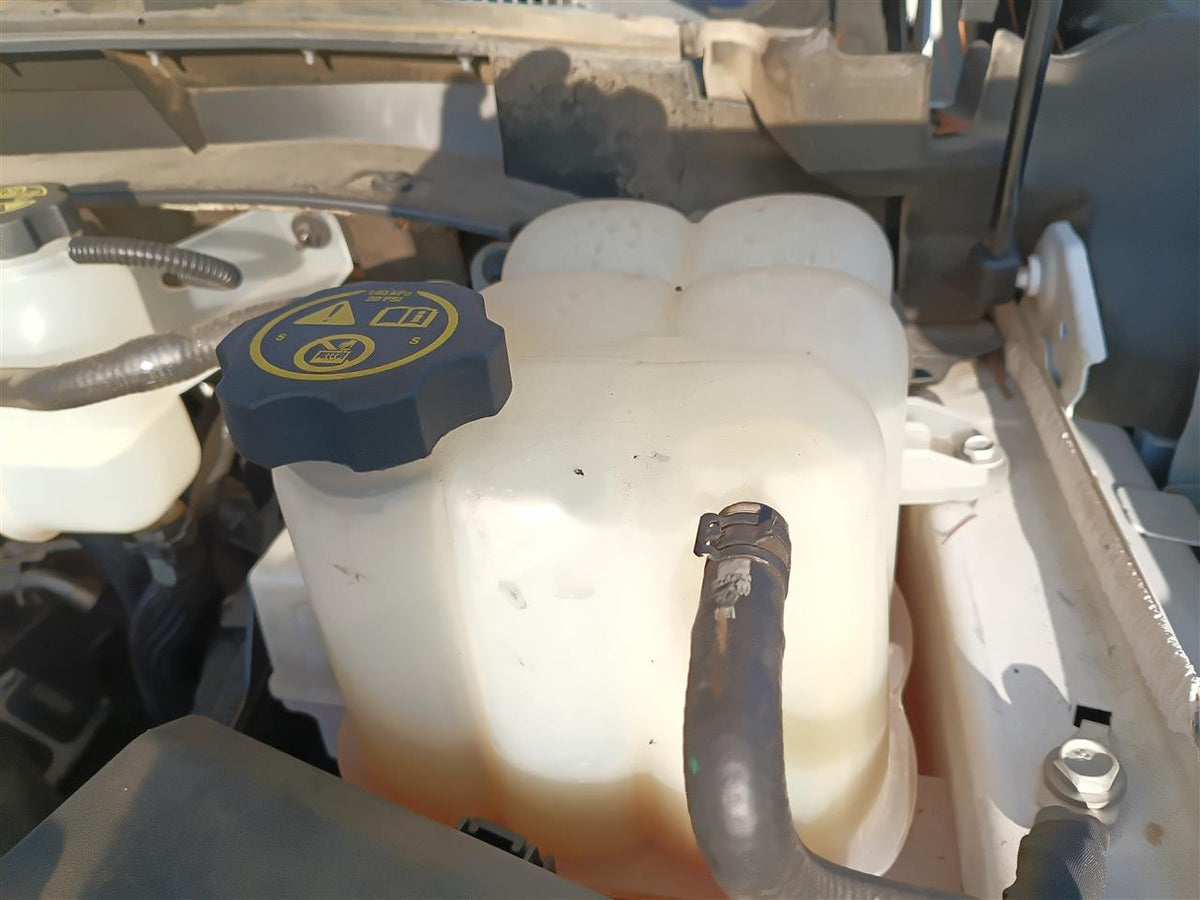 Used OEM Coolant Overflow Reservoir Tank from 2023 GMC Sierra Denali 2500