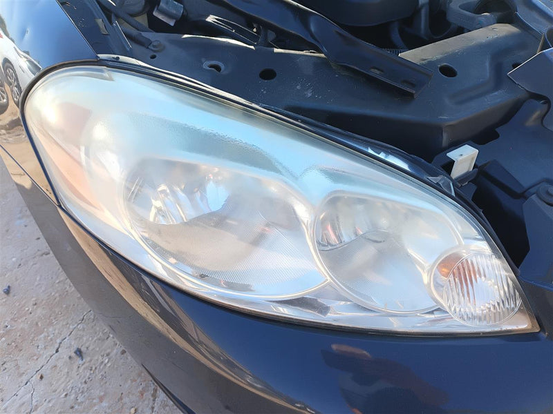 Used OEM Passenger Side Right Headlight Headlamp Assembly from 2016 Chevrolet Impala