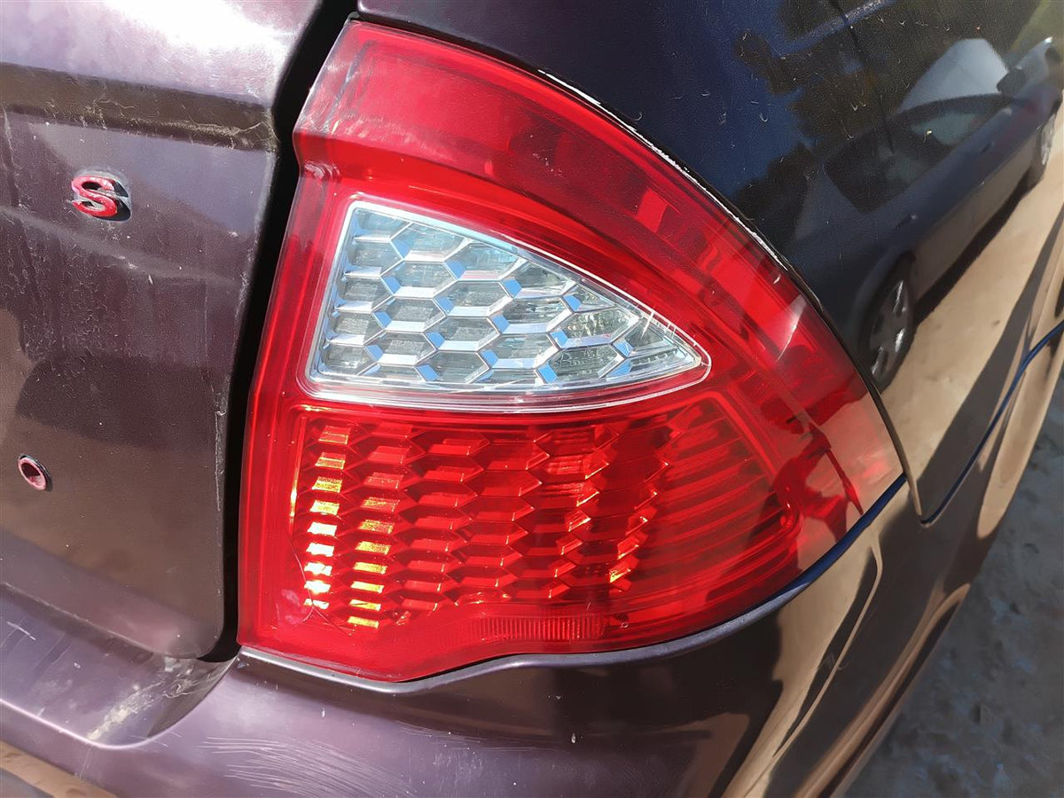 Used OEM Passenger Side Right Tail Light Lamp Assembly from 2011 Ford Fusion