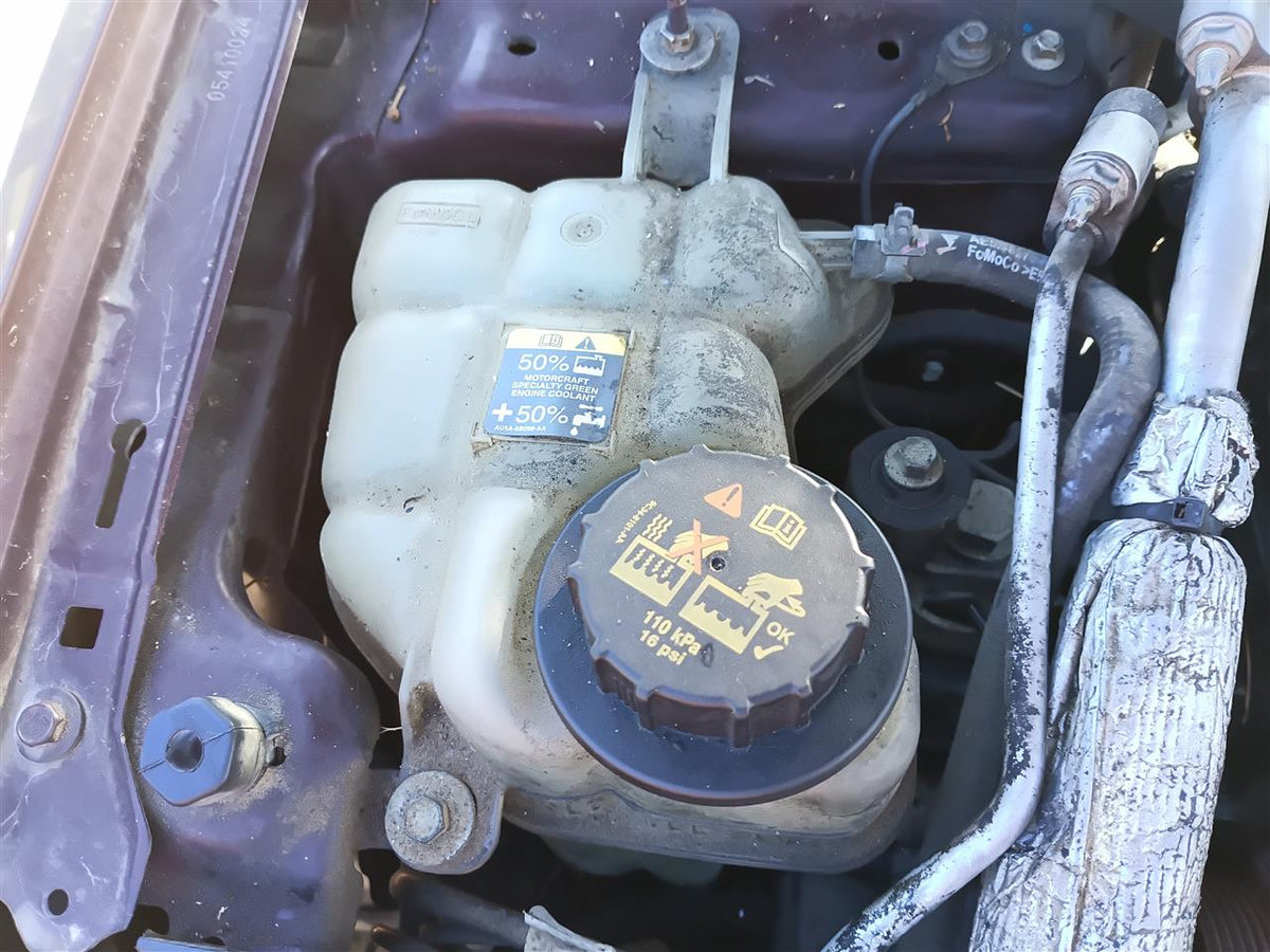 Used OEM Coolant Overflow Reservoir Tank from 2011 Ford Fusion