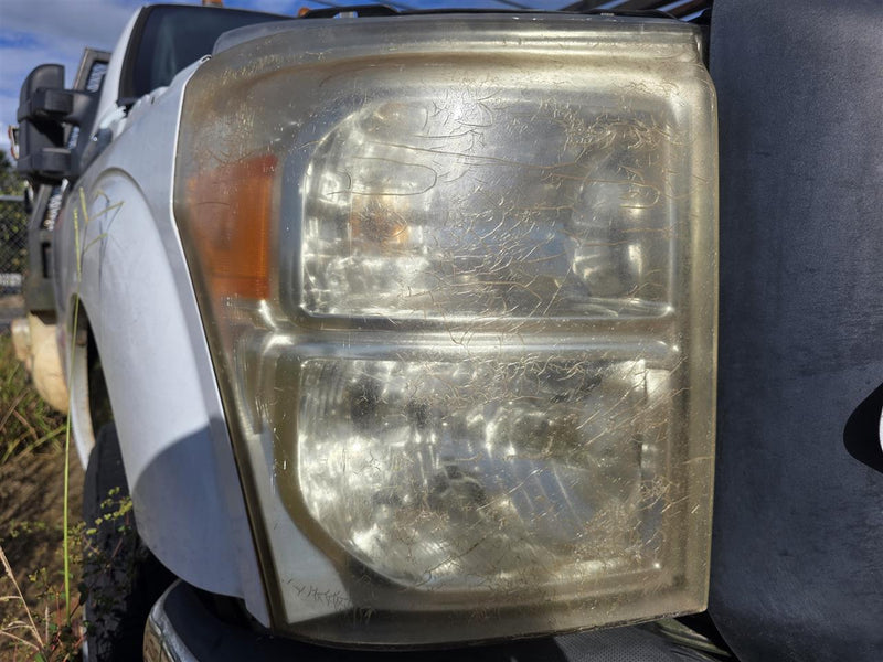 Used OEM Passenger Side Right Headlight Headlamp Assembly from 2013 Ford F350SD
