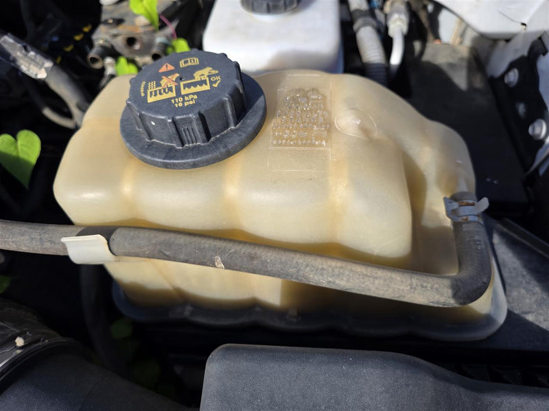 Used OEM Passenger Side Right Coolant Overflow Reservoir Tank from 2013 Ford F350SD