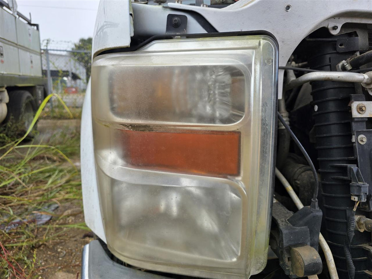 Used OEM Passenger Side Right Headlight Headlamp Assembly from 2010 Ford F350SD