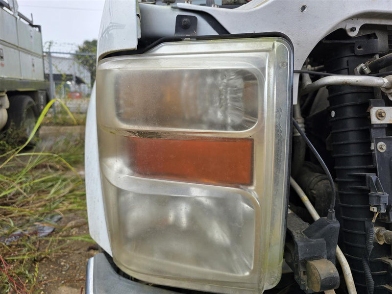Used OEM Passenger Side Right Headlight Headlamp Assembly from 2010 Ford F350SD