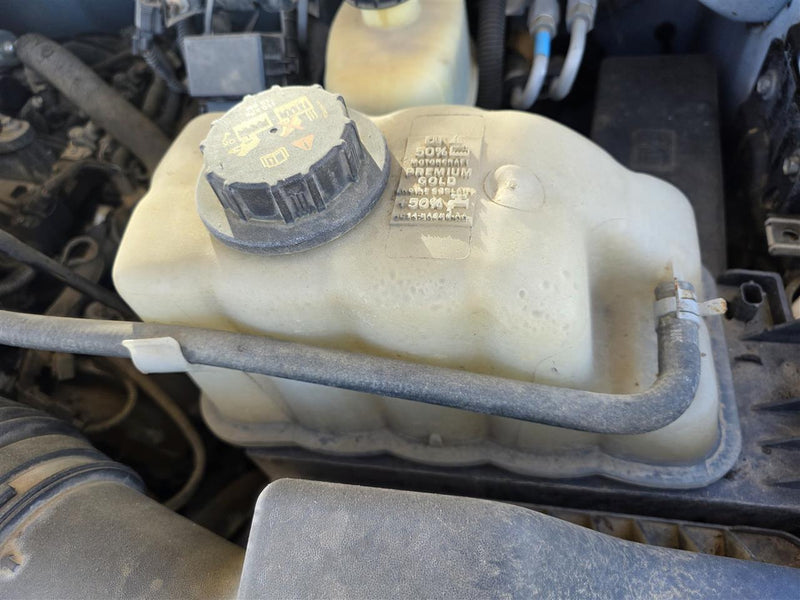 Used OEM Coolant Overflow Reservoir Tank from 2010 Ford F350SD
