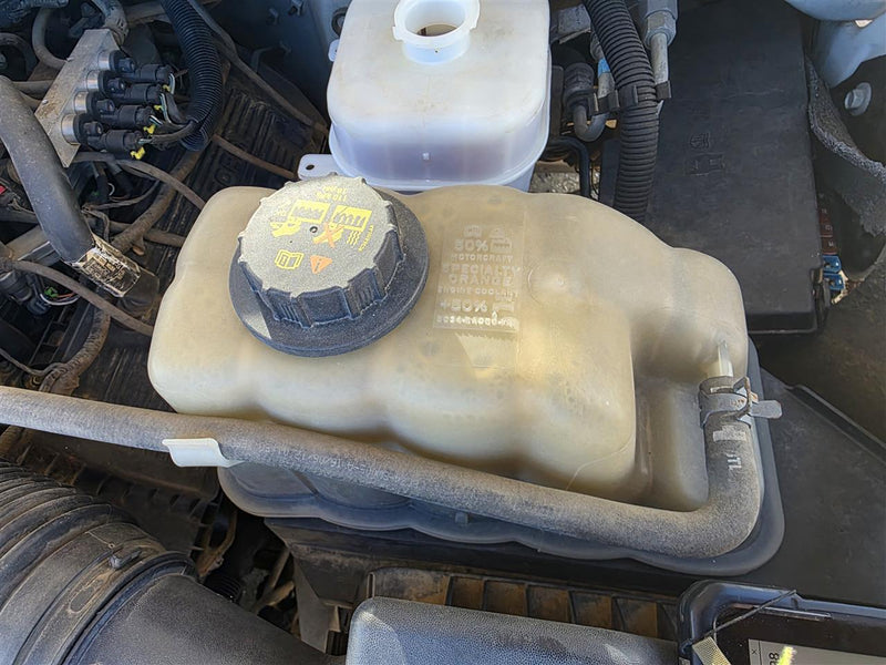 Used OEM Passenger Side Right Coolant Overflow Reservoir Tank from 2012 Ford F350SD