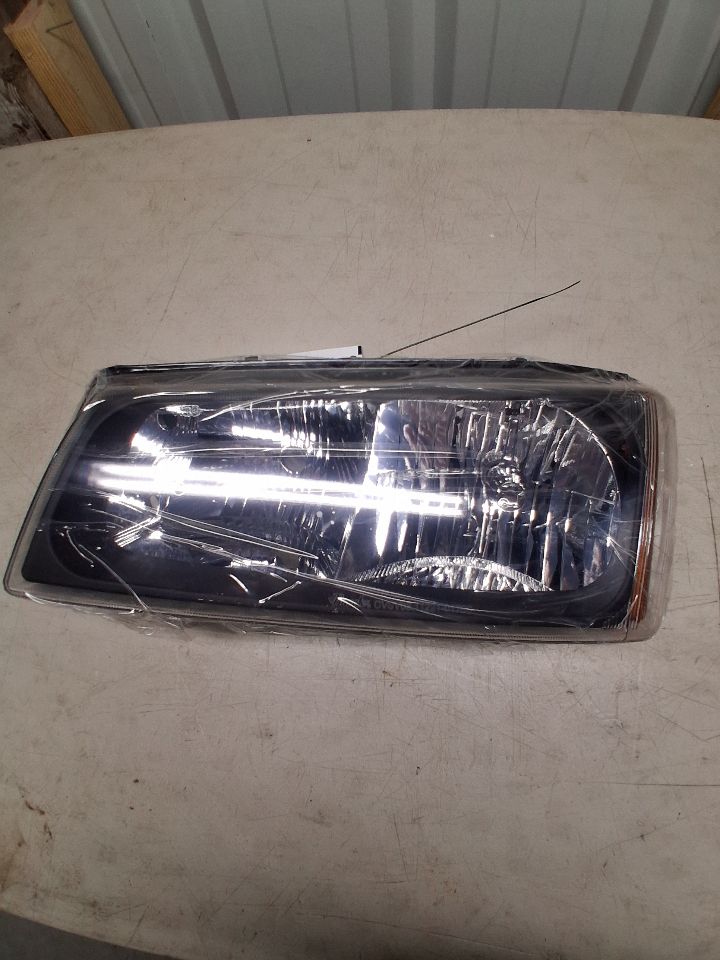 Used OEM Driver Side Left Headlight Headlamp Assembly from 2005 Chevrolet Silverado 1500