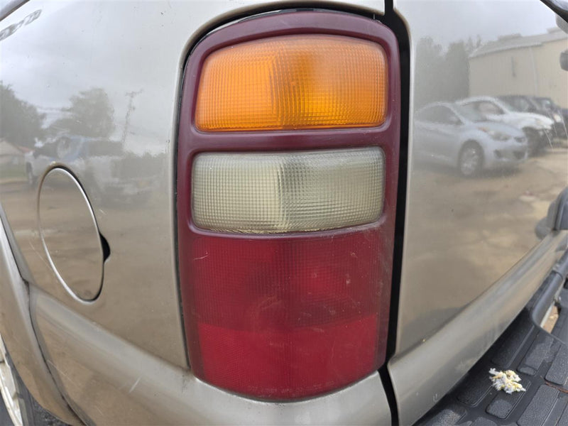 Used OEM Driver Side Left Tail Light Lamp Assembly from 2002 Chevrolet Suburban 1500