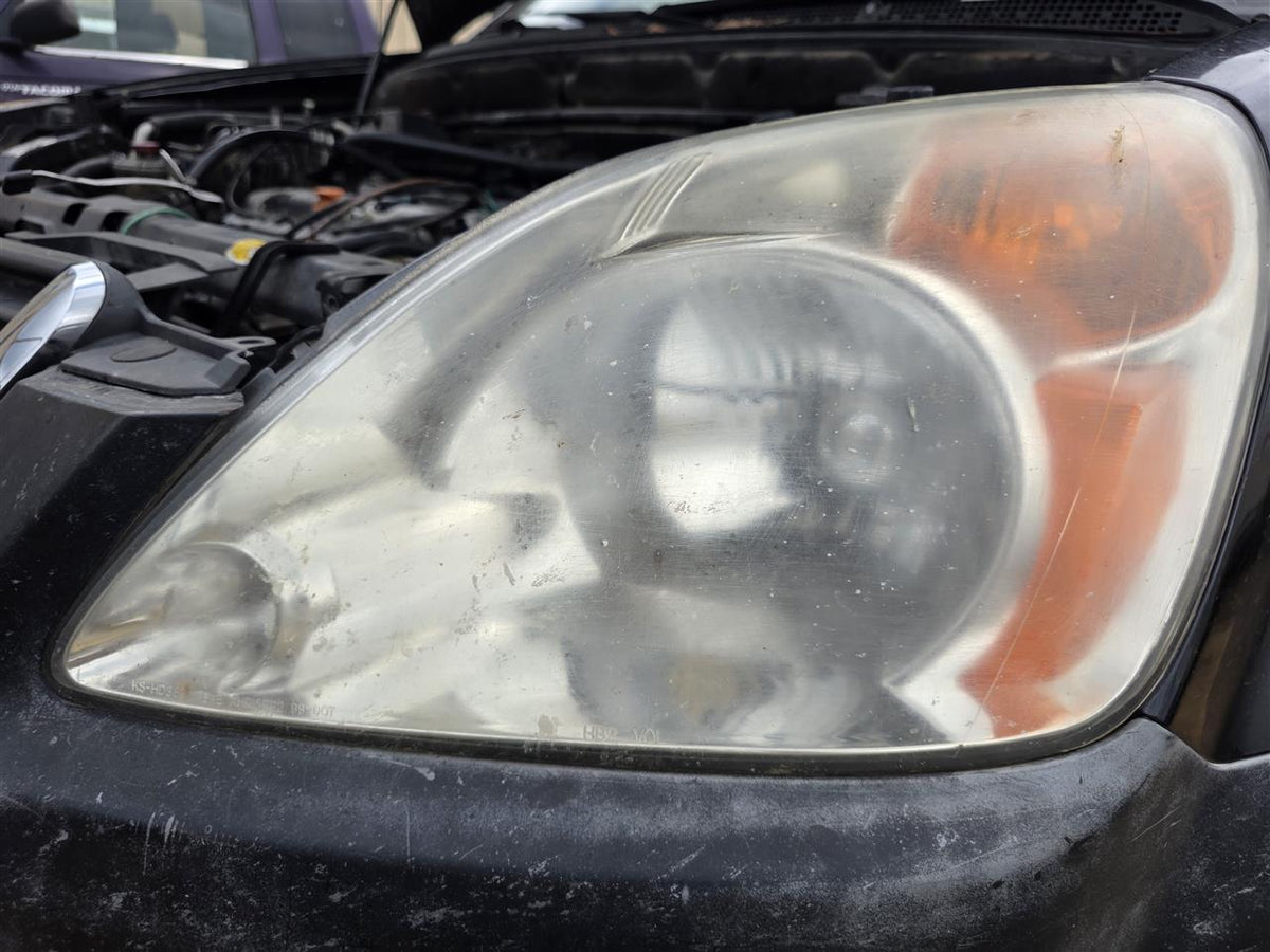Used OEM Driver Side Left Headlight Headlamp Assembly from 2004 Honda CR-V