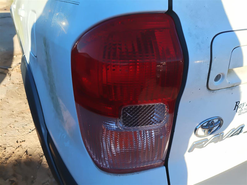 Used OEM Driver Side Left Tail Light Lamp Assembly from 2003 Toyota RAV4